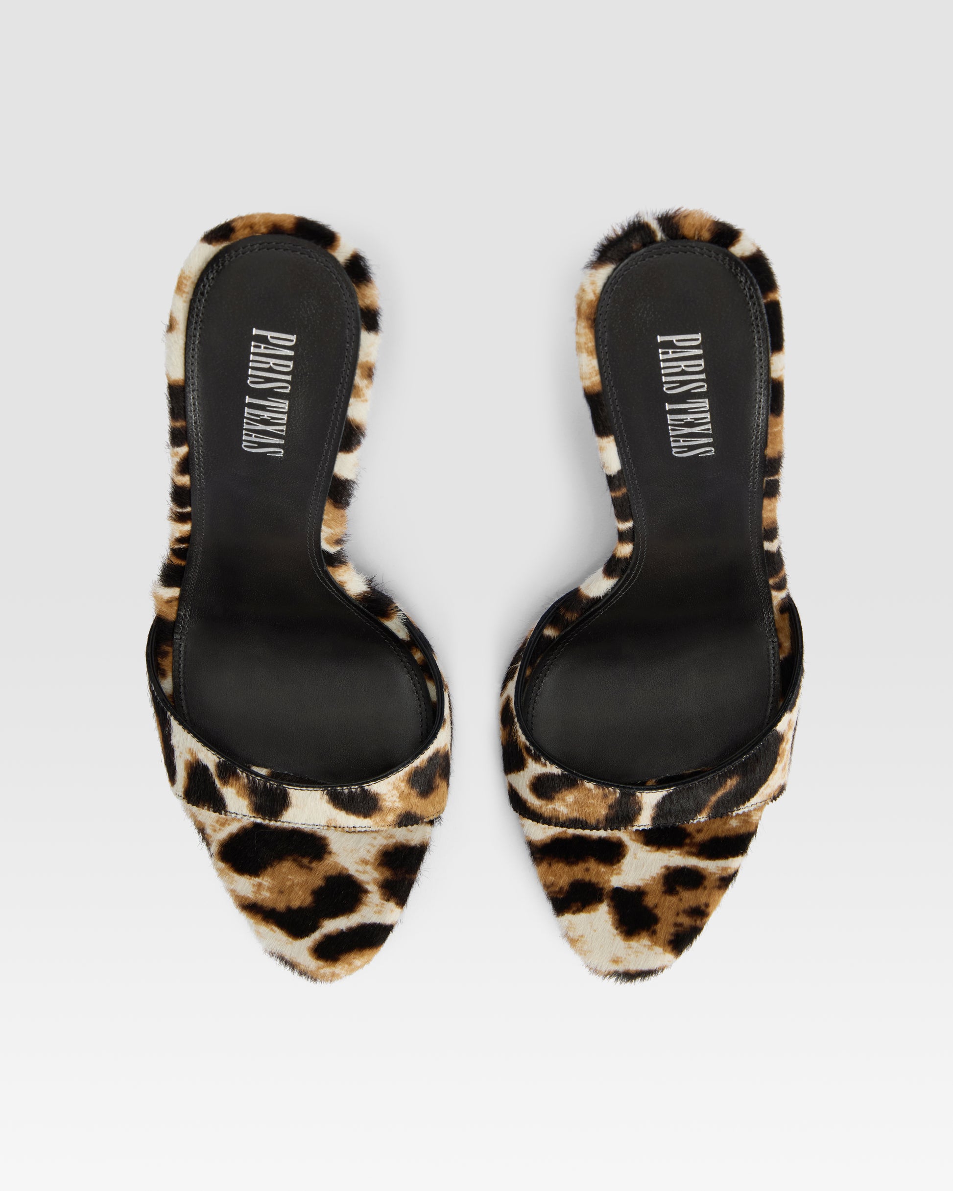 Mules en cuir de vachette a imprime leopard blanc