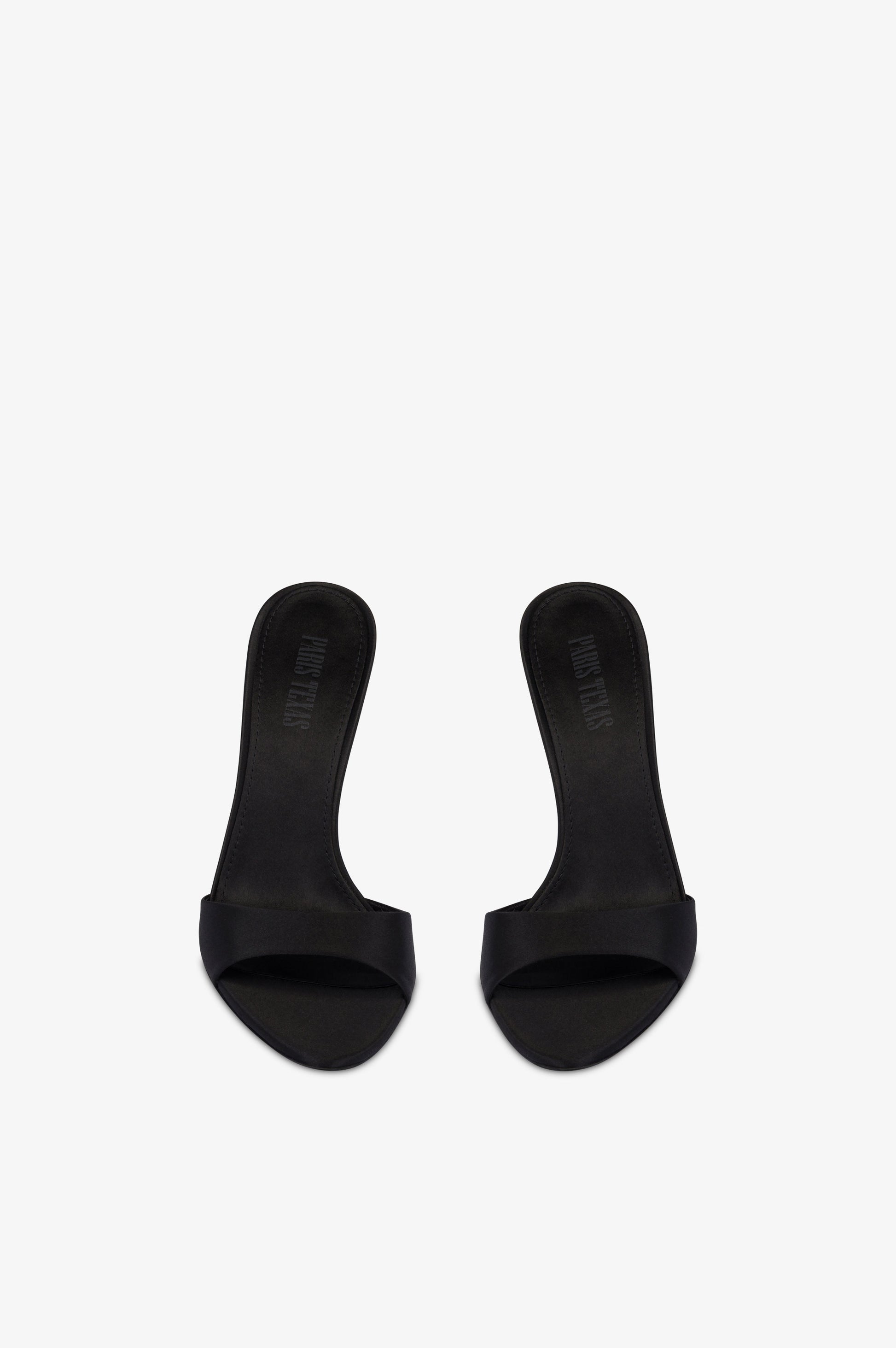 Mules in black satin.