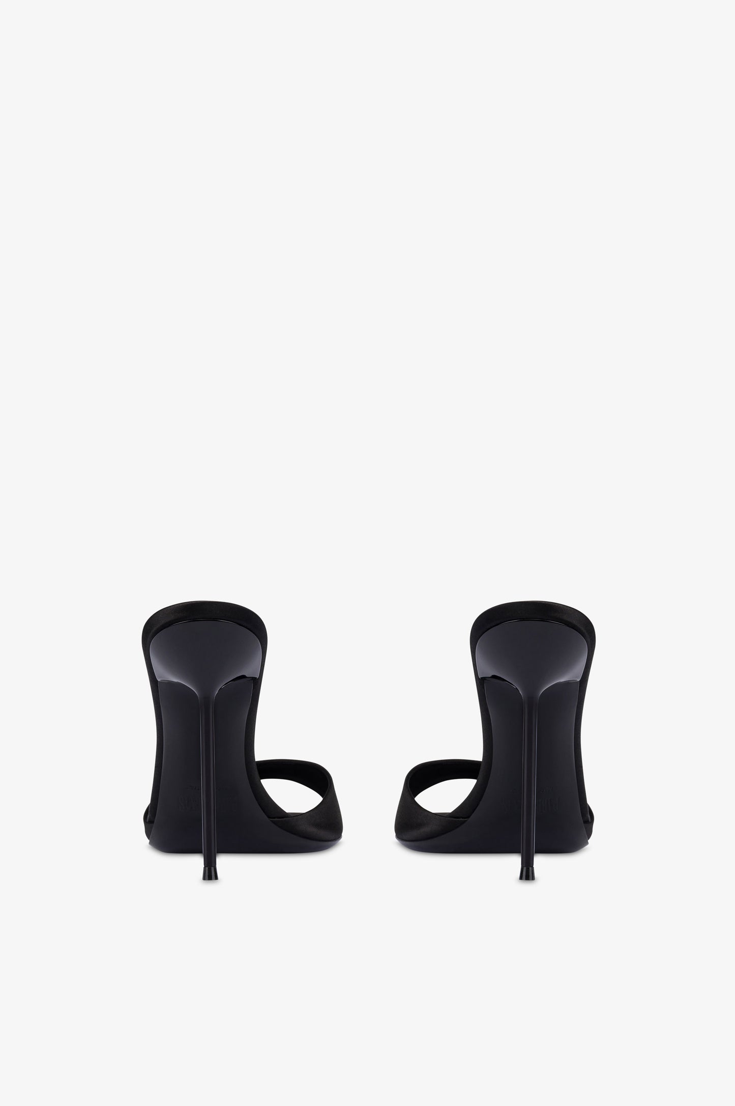 Mules in black satin.