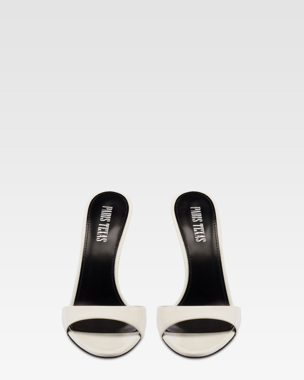 Mules en charol blanco