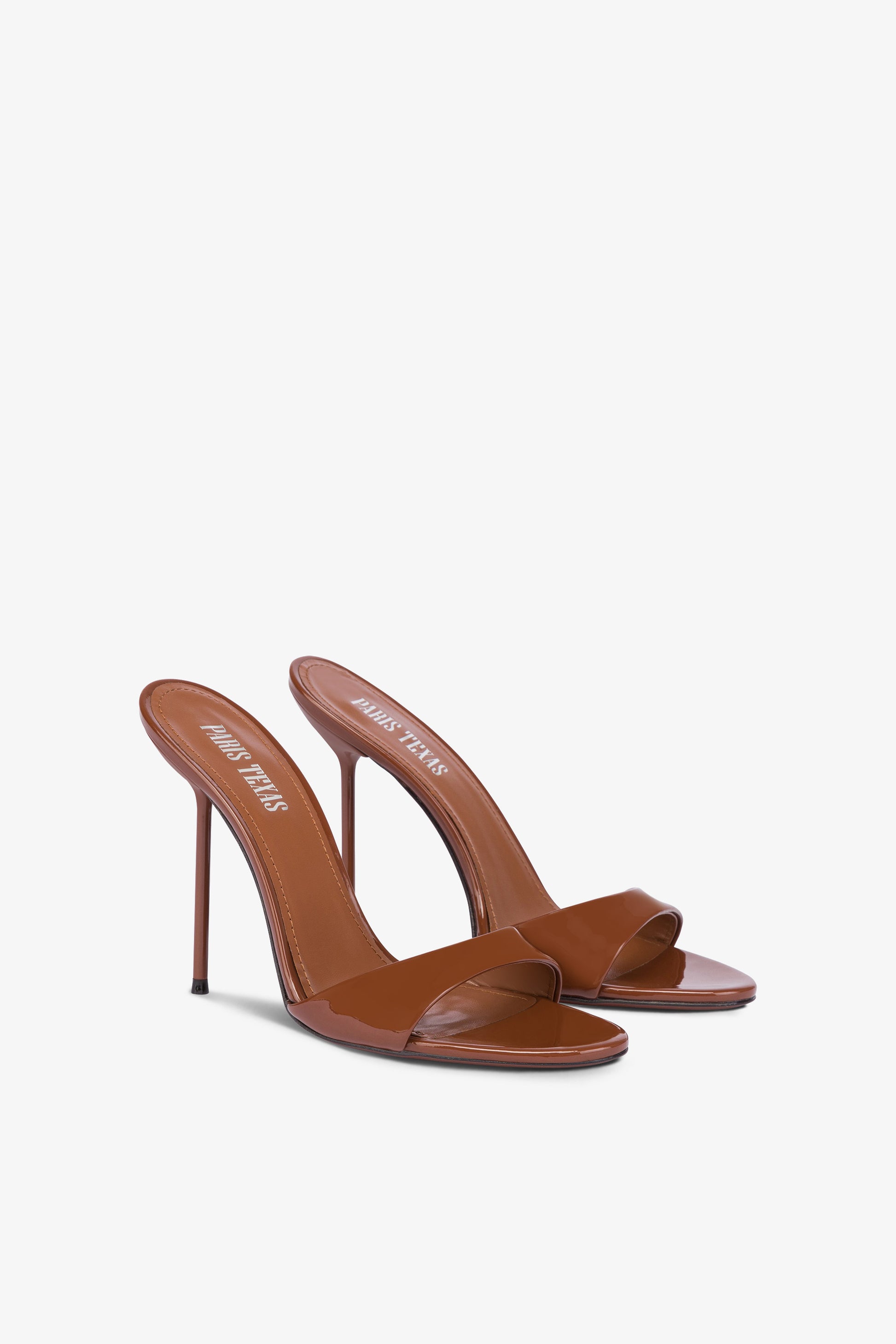 Almond-toe mules in patent brown leather