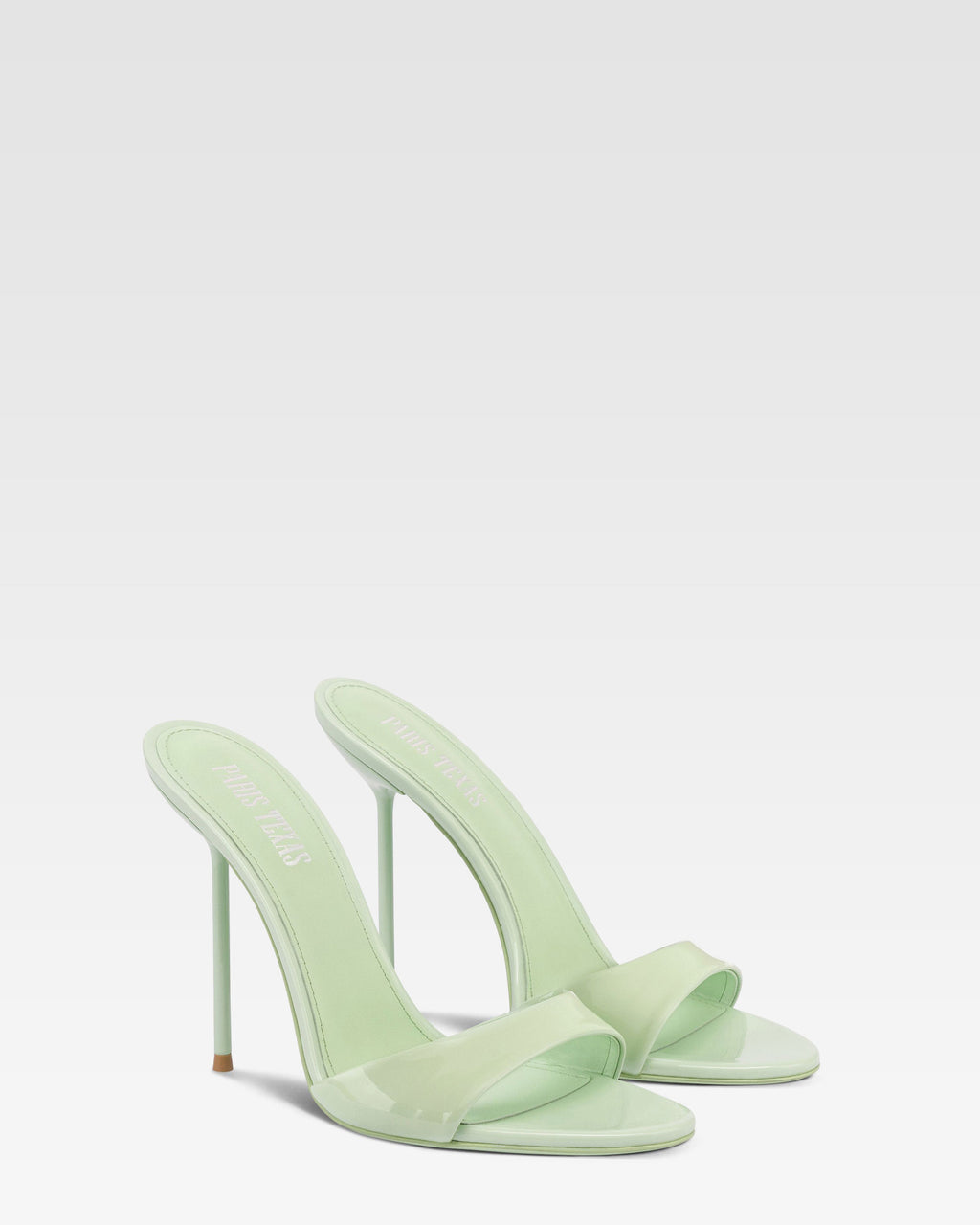 Mules in mint patent leather