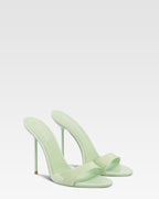 Mules in mint patent leather