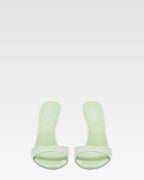 Mules in mint patent leather