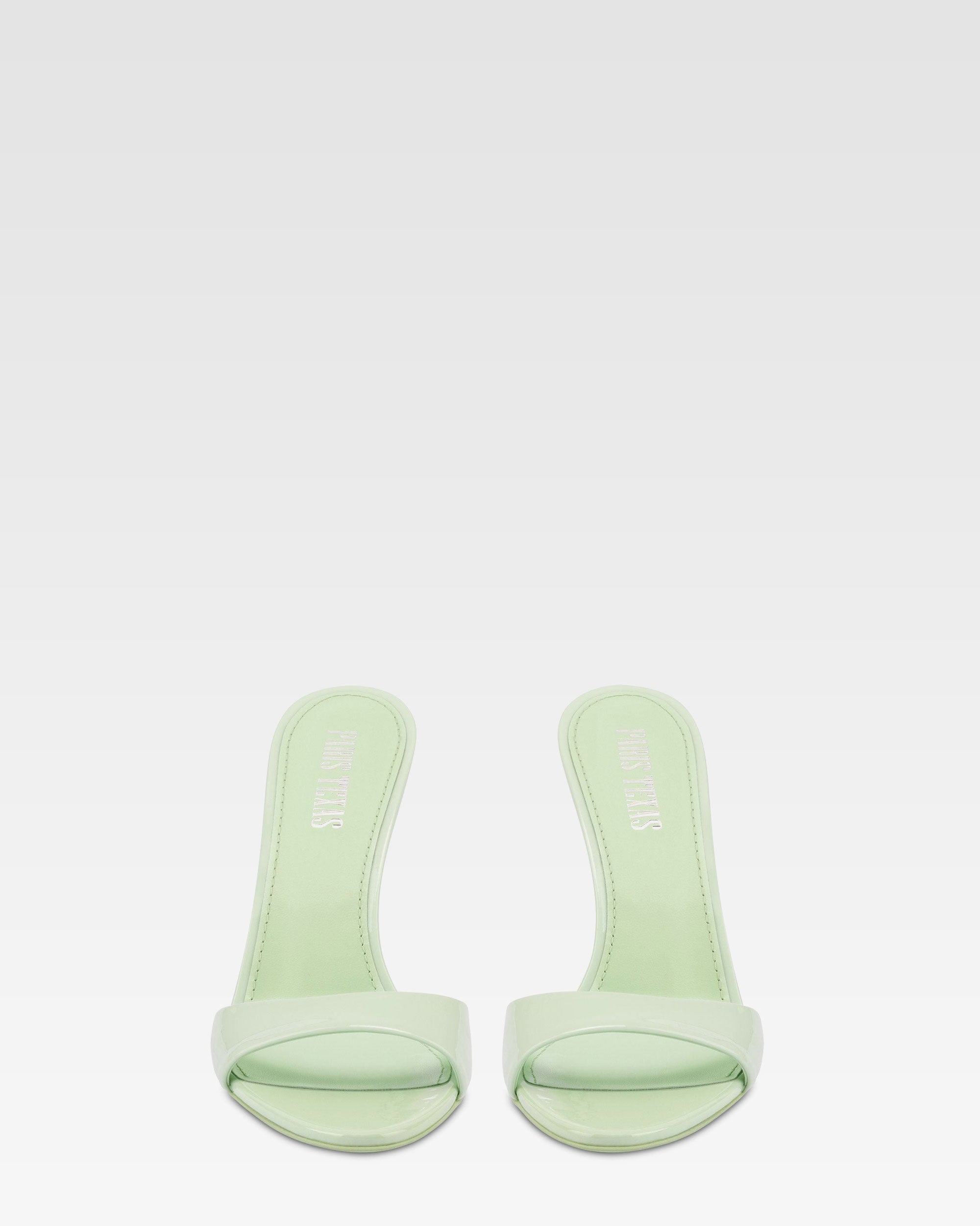 Mules in mint patent leather