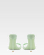 Mules in mint patent leather