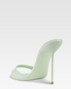 Mules in mint patent leather