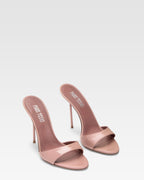Mules in patent pink