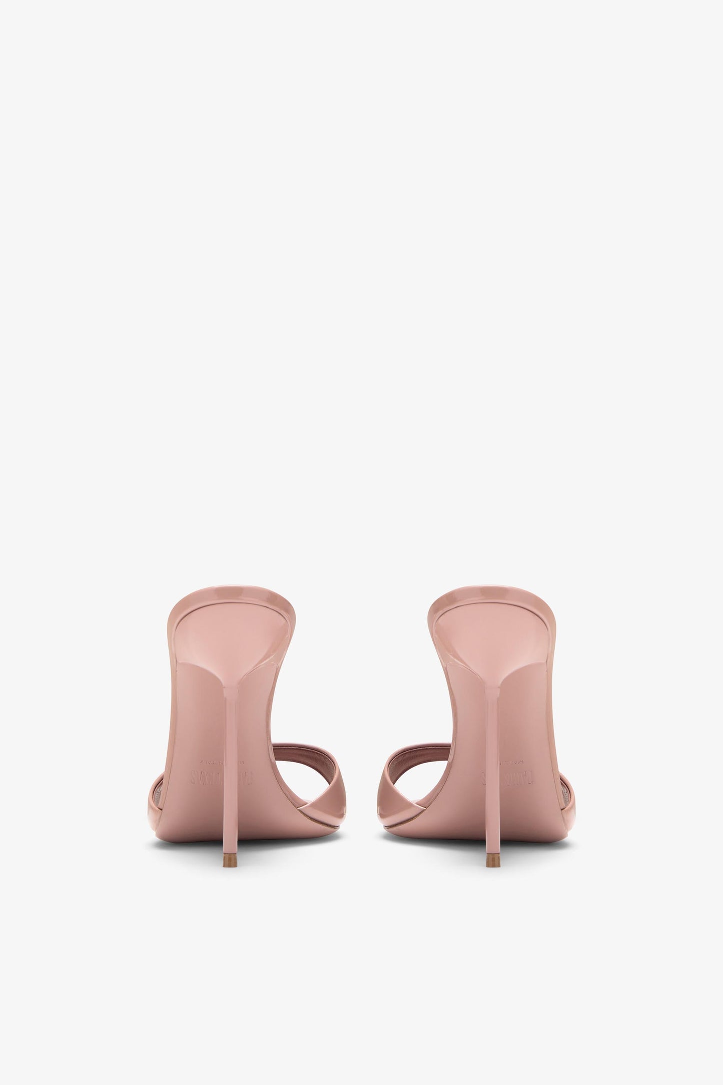 Mules in patent pink