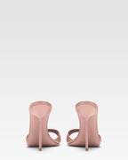 Mules in patent pink