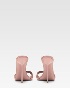Mules in patent pink