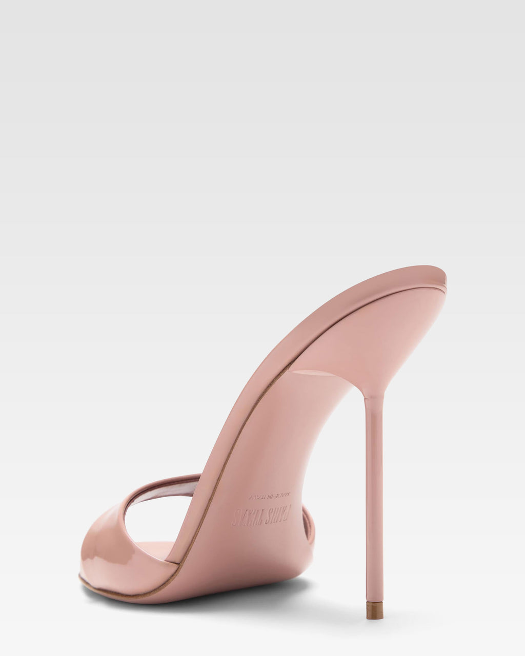 Mules in patent pink