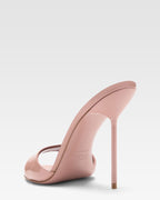 Mules in patent pink