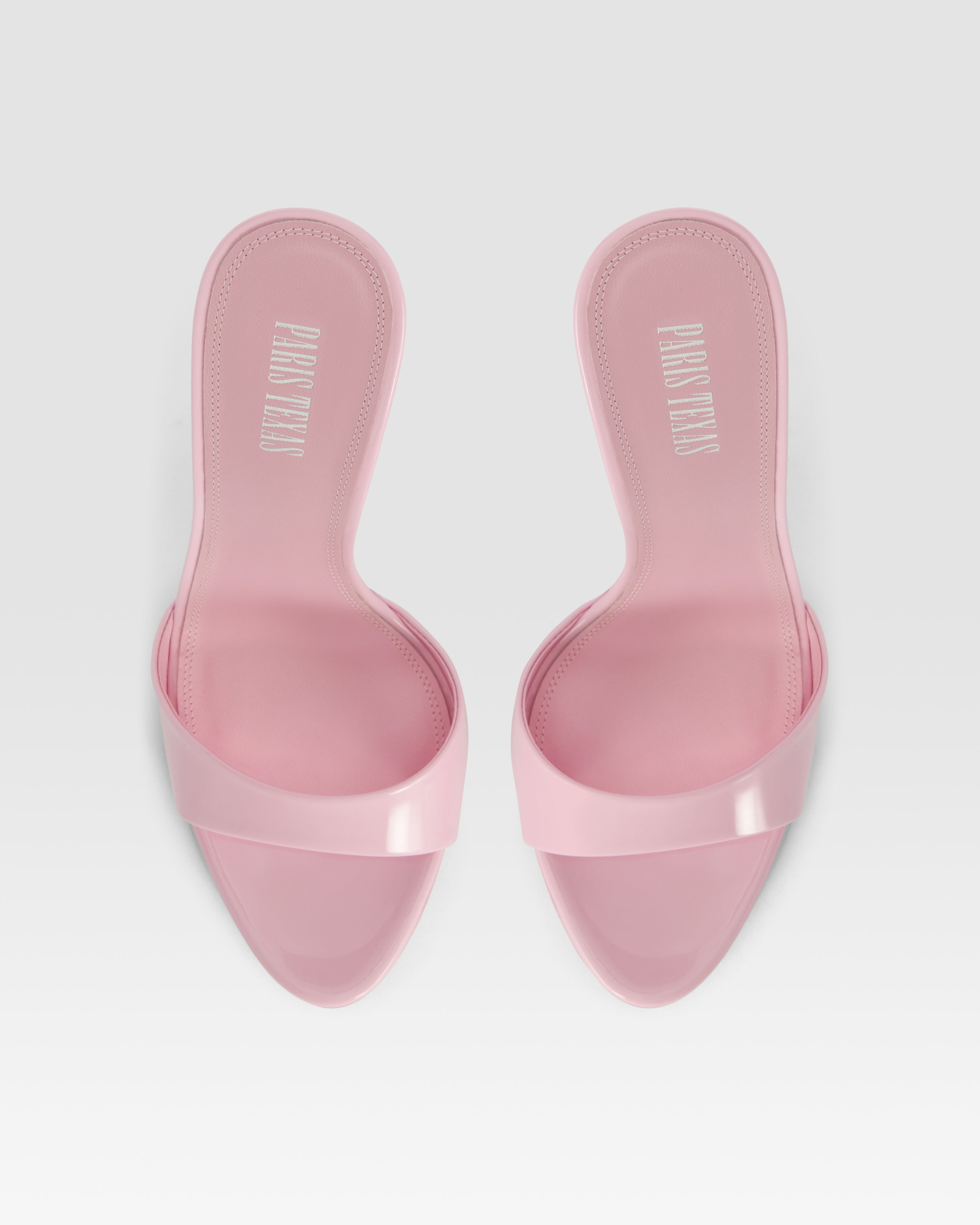 Mules in petal pink patent leather