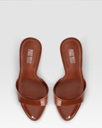 Mules in desert rose patent leather
