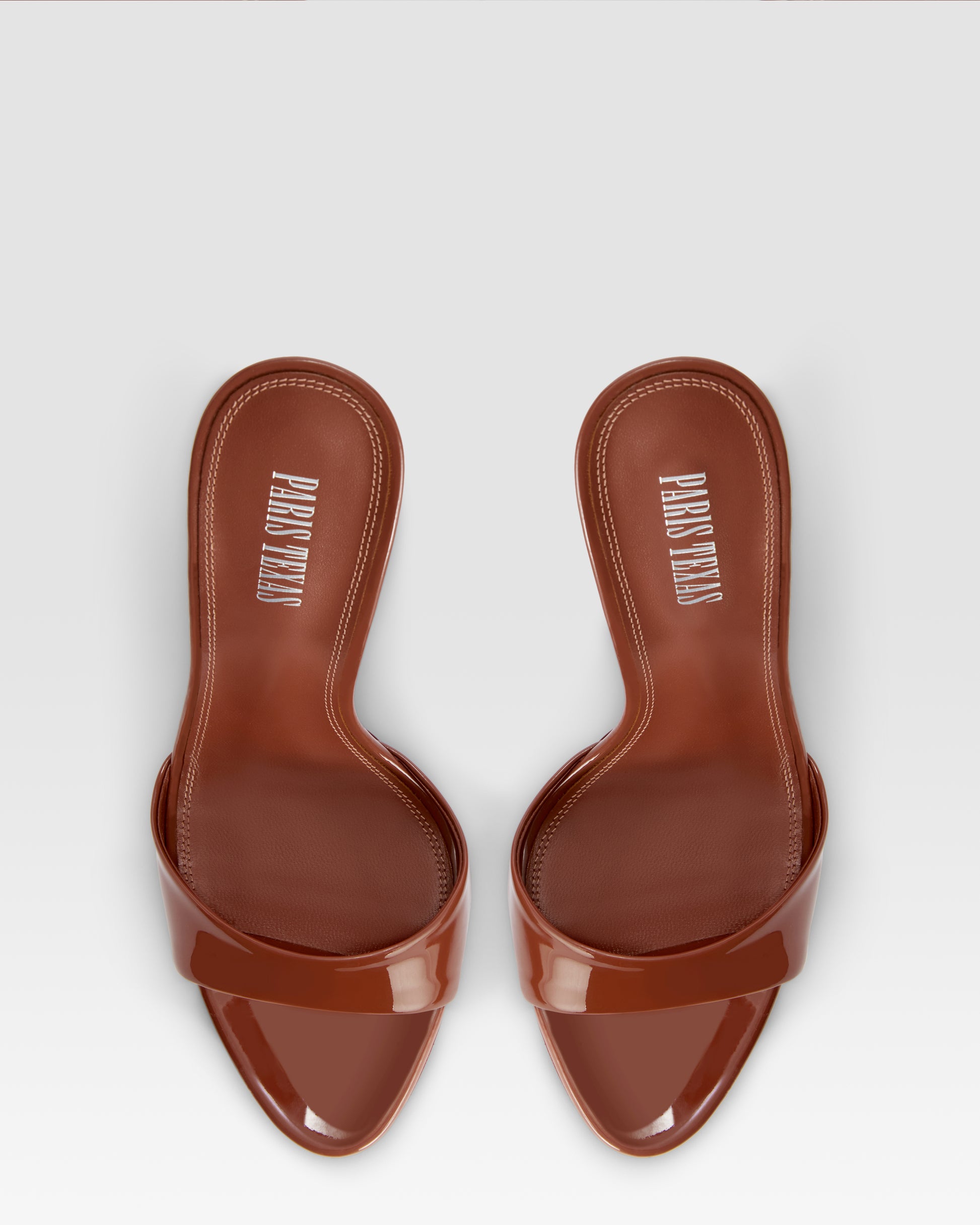 Mules in desert rose patent leather