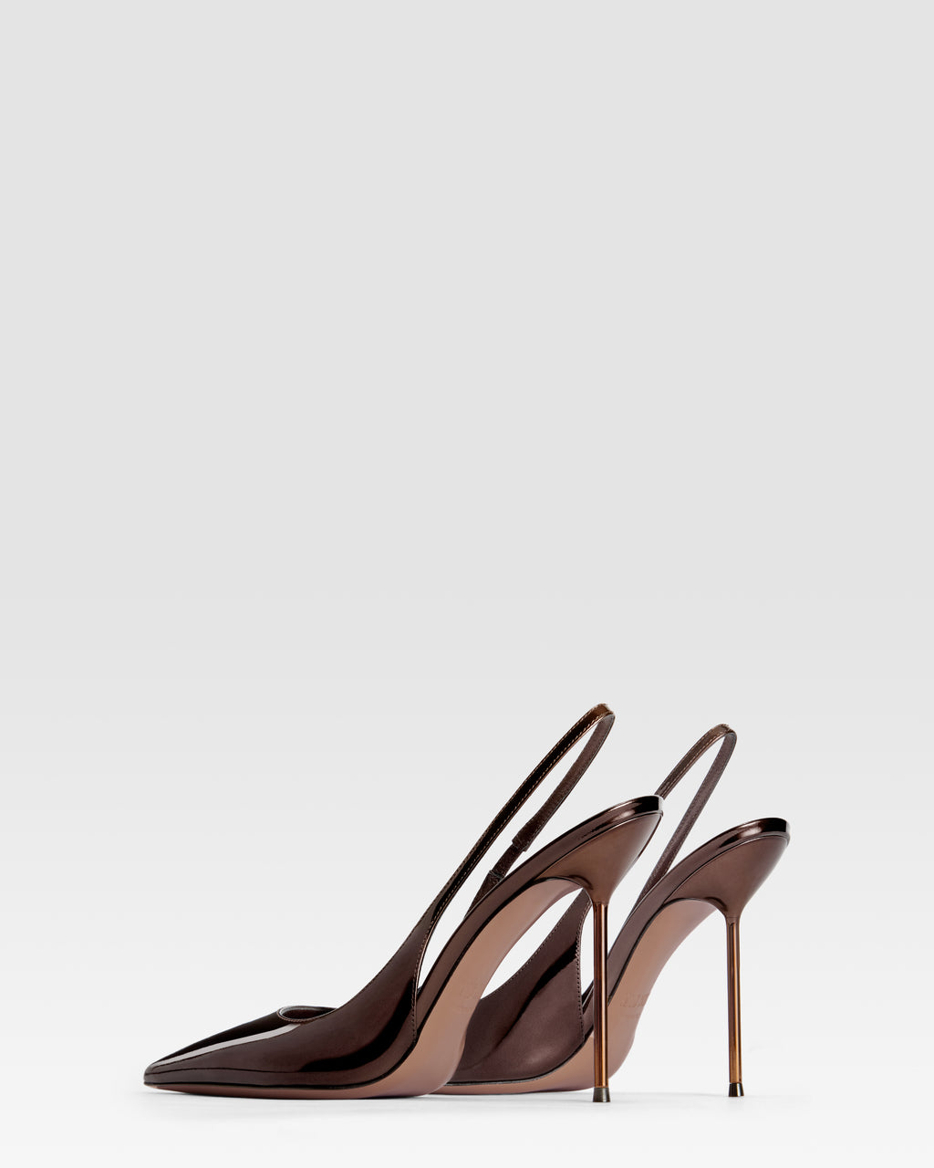 Slingbacks in ebony, mirror-effect leather