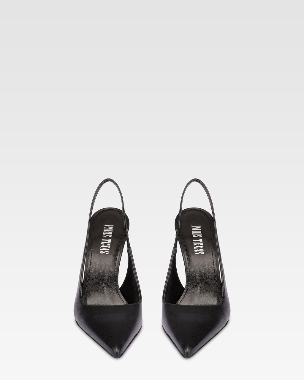 Zapatos destalonados de punta fina en suave piel negra