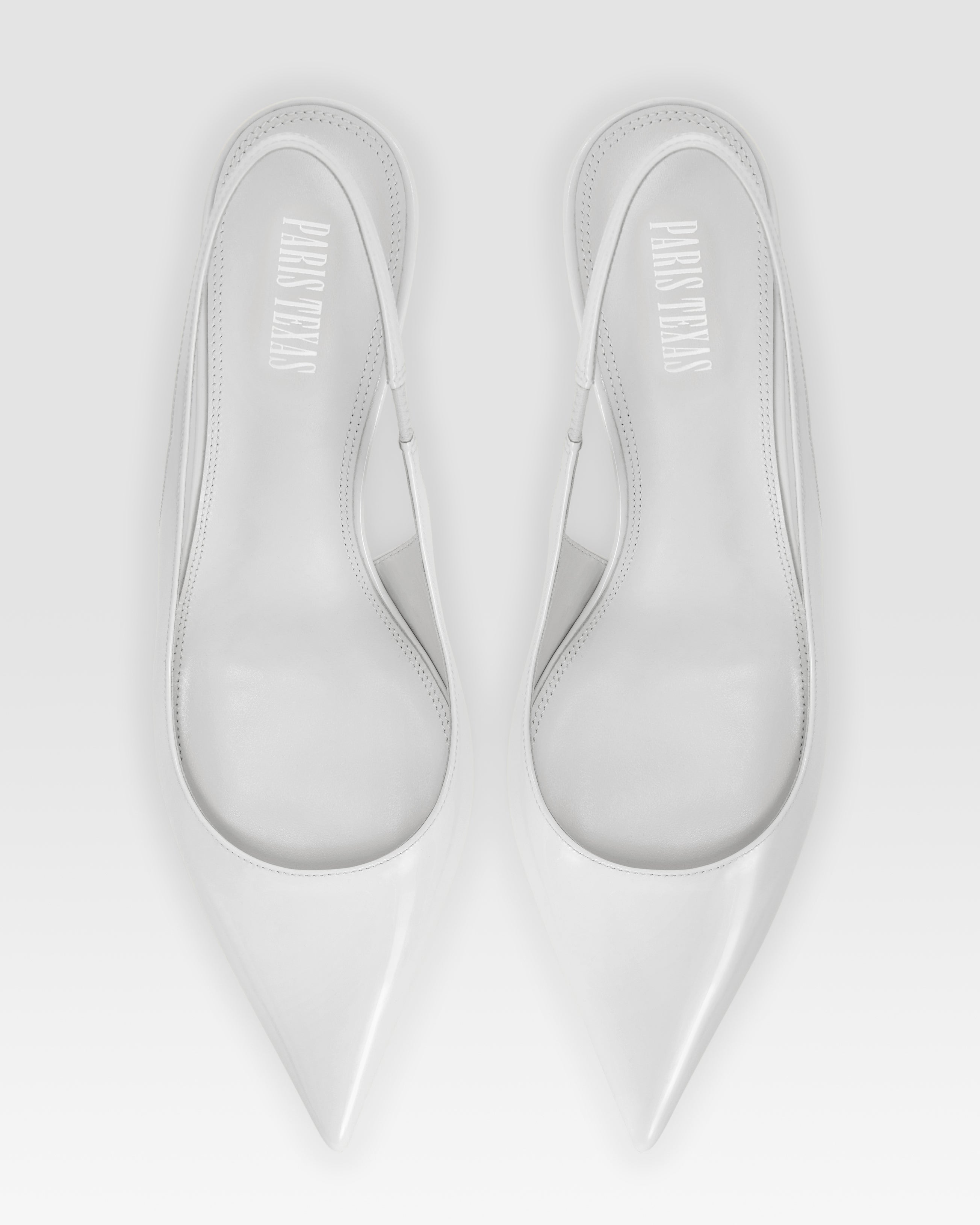 Zapatos destalonados de charol color blanco optico