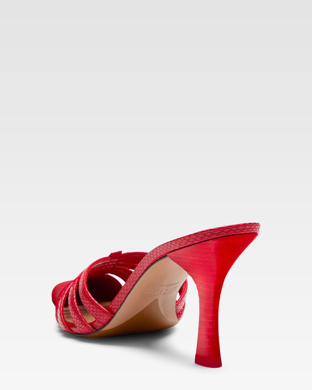 Mule en cuir rouge a decoupes